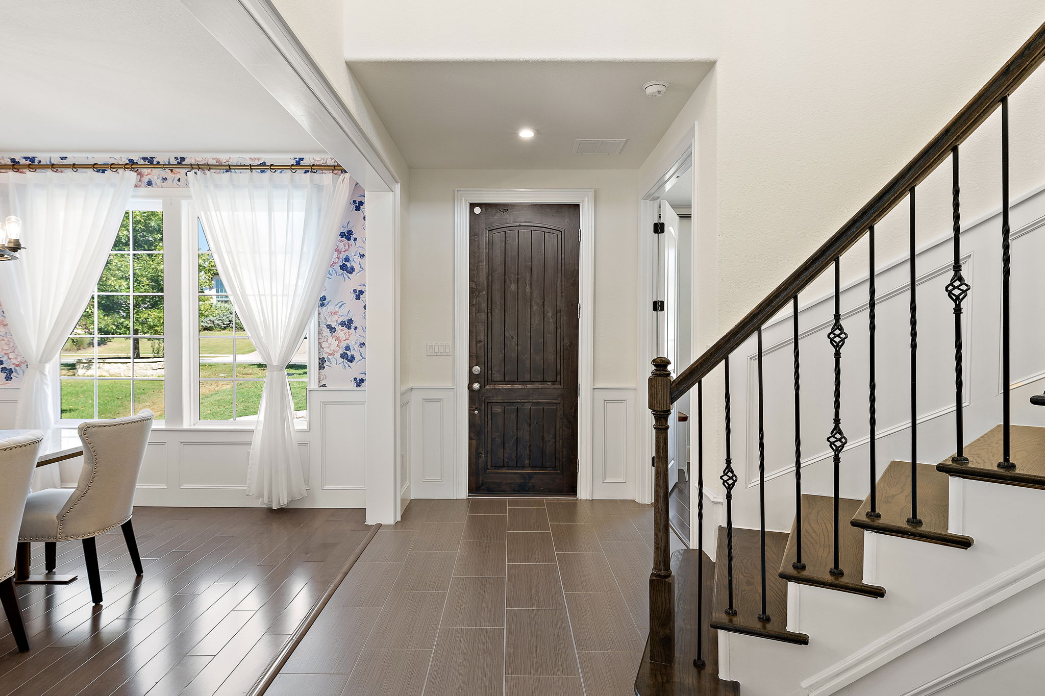 218 Encanto Place Austin, TX 78737 - Photo 9 of 40 a view of an entryway with wooden floor and door