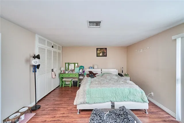 a bed room with a bed and a table