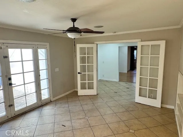 a view of empty room with windows
