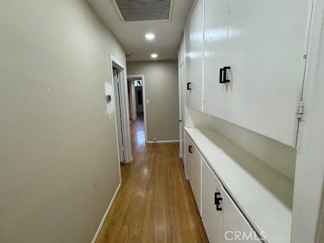 a bathroom with a sink and a large mirror