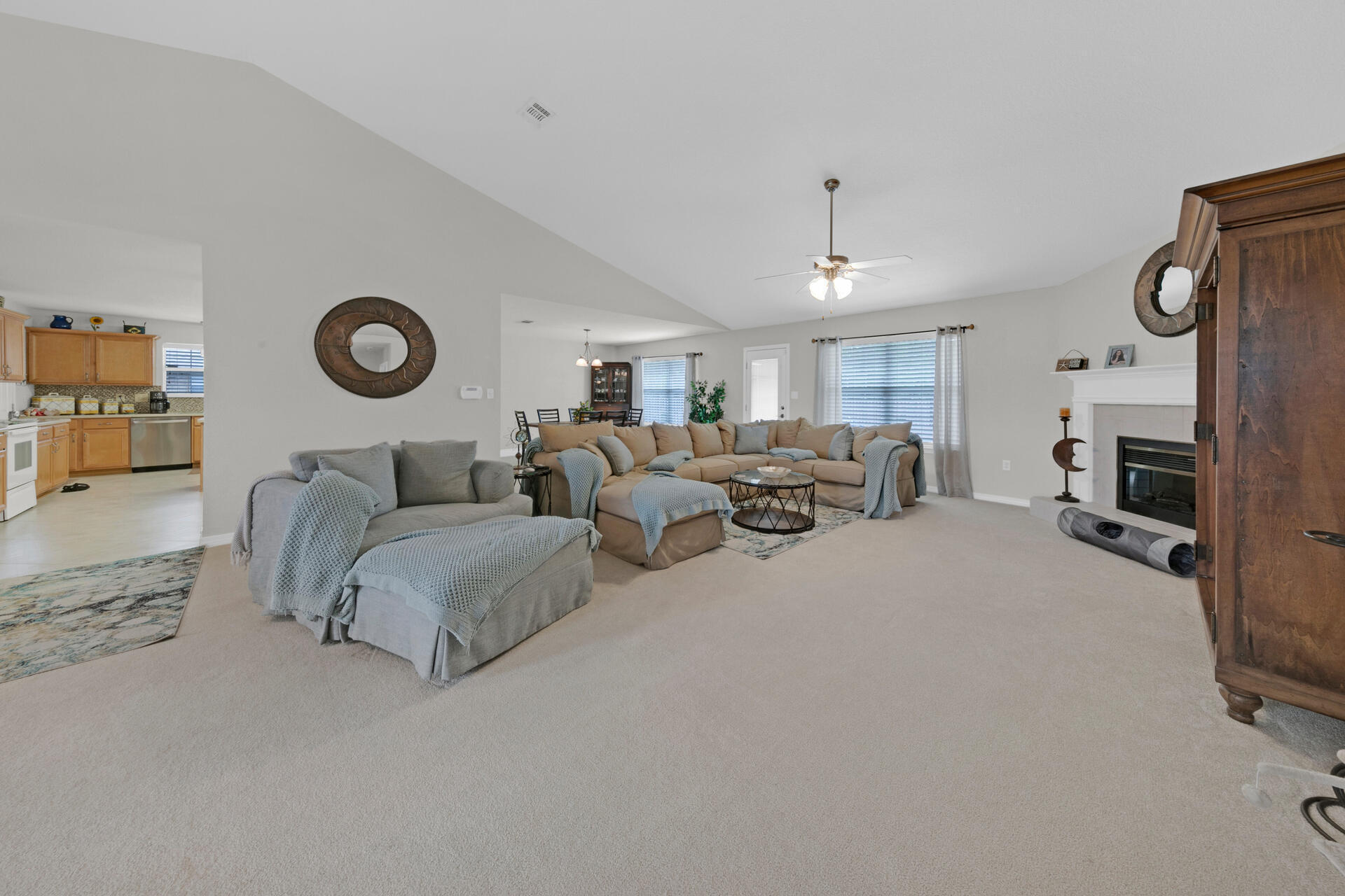 20 East Shipwreck Road Santa Rosa Beach, FL 32459 - Photo 12 of 37 a living room with furniture a fireplace and a flat screen tv