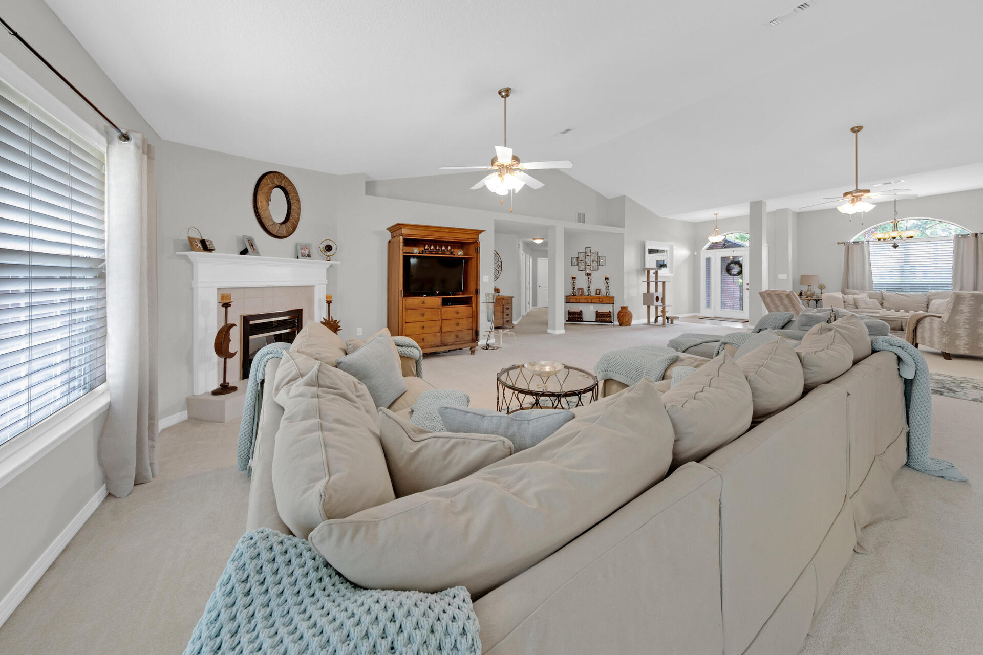 20 East Shipwreck Road Santa Rosa Beach, FL 32459 - Photo 13 of 37 a living room with furniture kitchen view and a chandelier
