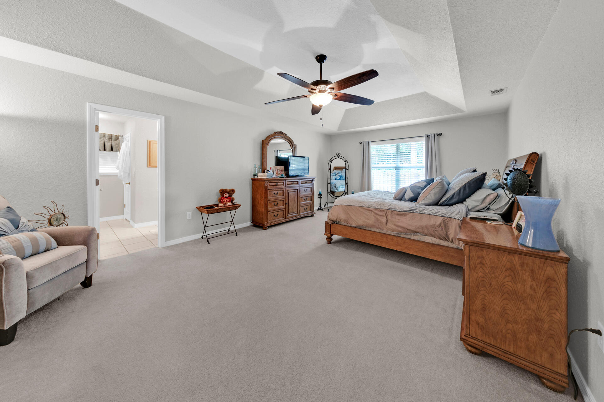 20 East Shipwreck Road Santa Rosa Beach, FL 32459 - Photo 16 of 37 a bedroom with furniture and a large window