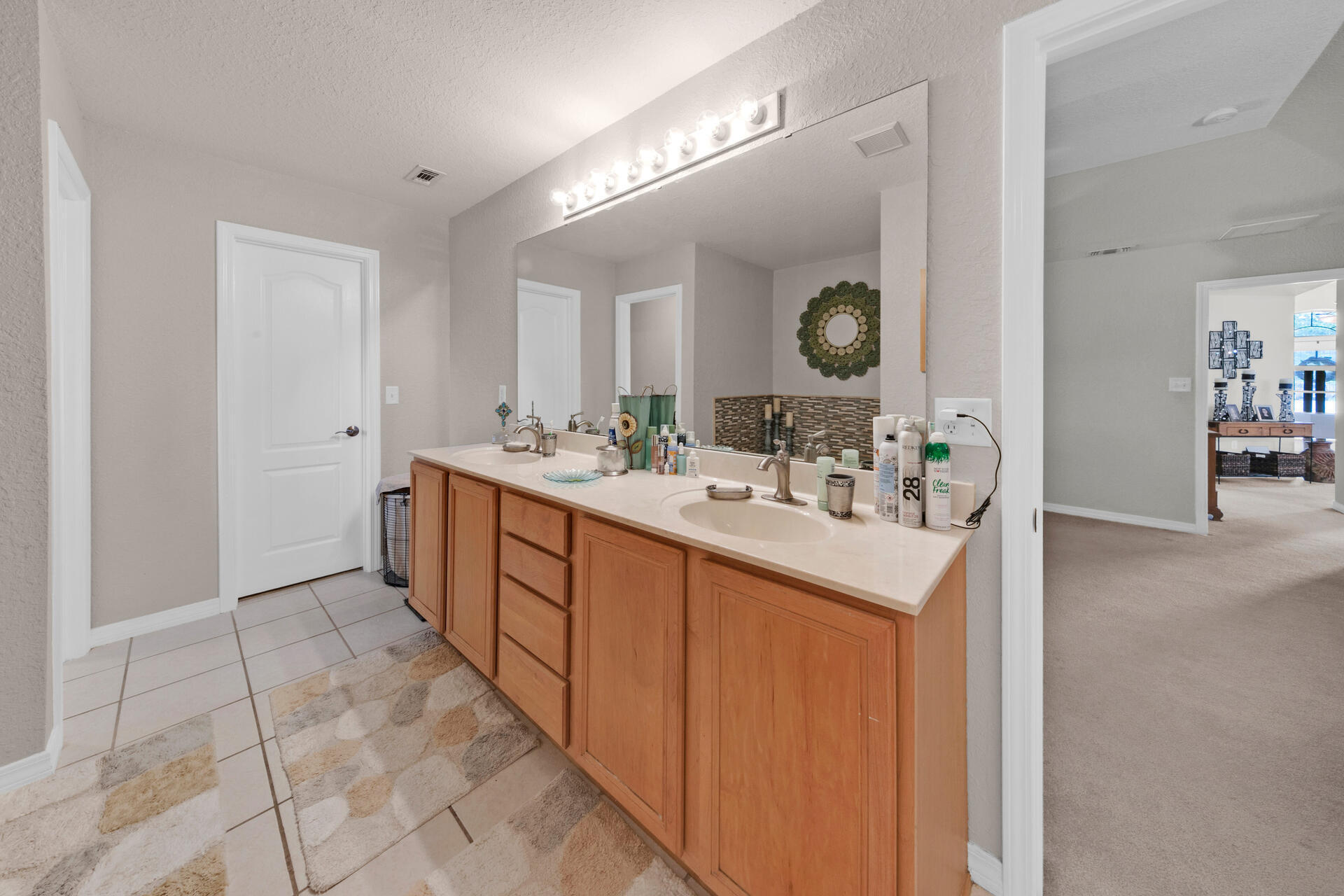 20 East Shipwreck Road Santa Rosa Beach, FL 32459 - Photo 17 of 37 a bathroom with a sink vanity and mirror