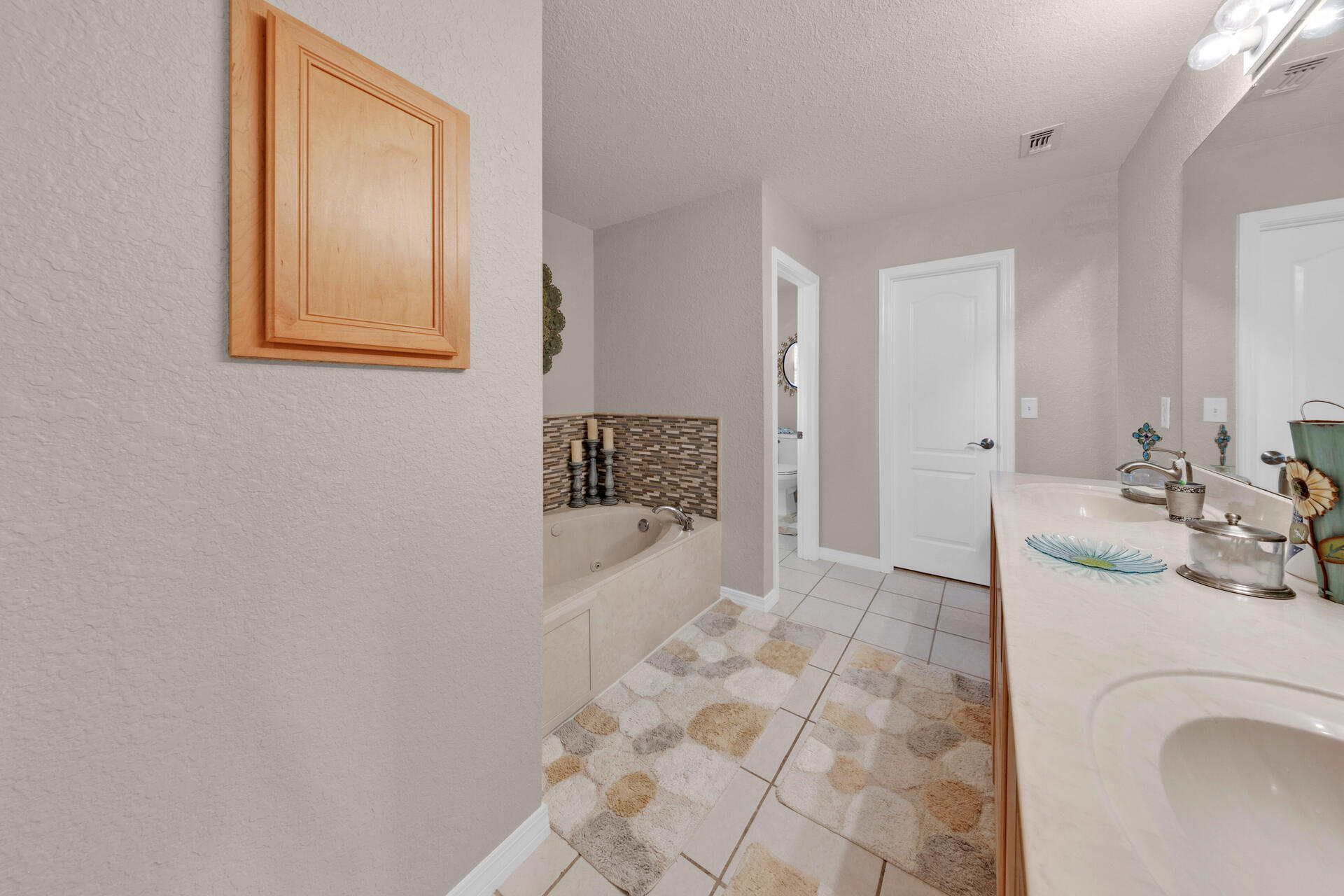 20 East Shipwreck Road Santa Rosa Beach, FL 32459 - Photo 18 of 37 a view of a bathroom with a sink and a bathtub