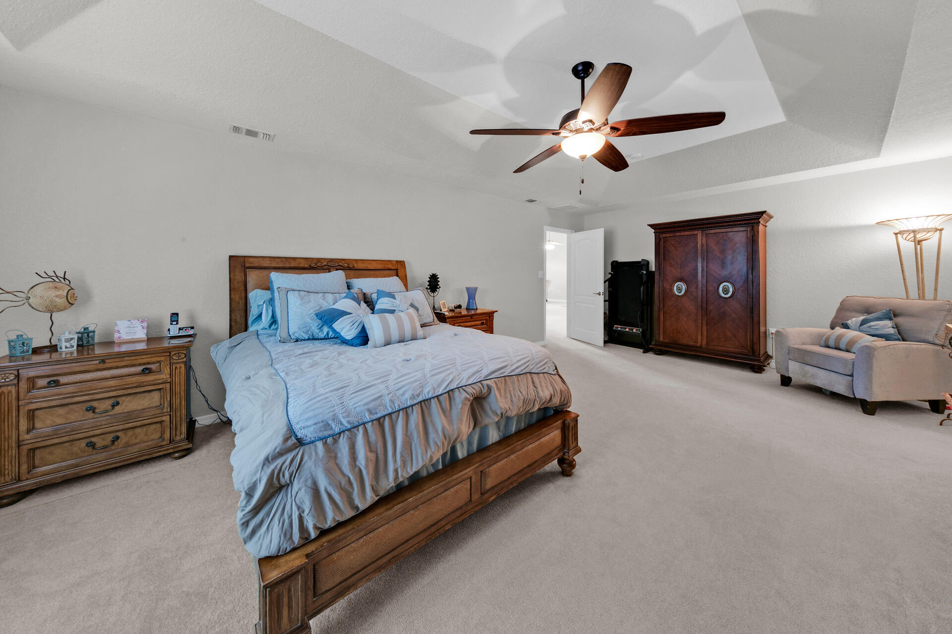 20 East Shipwreck Road Santa Rosa Beach, FL 32459 - Photo 21 of 37 a bed room with a bed and a ceiling fan