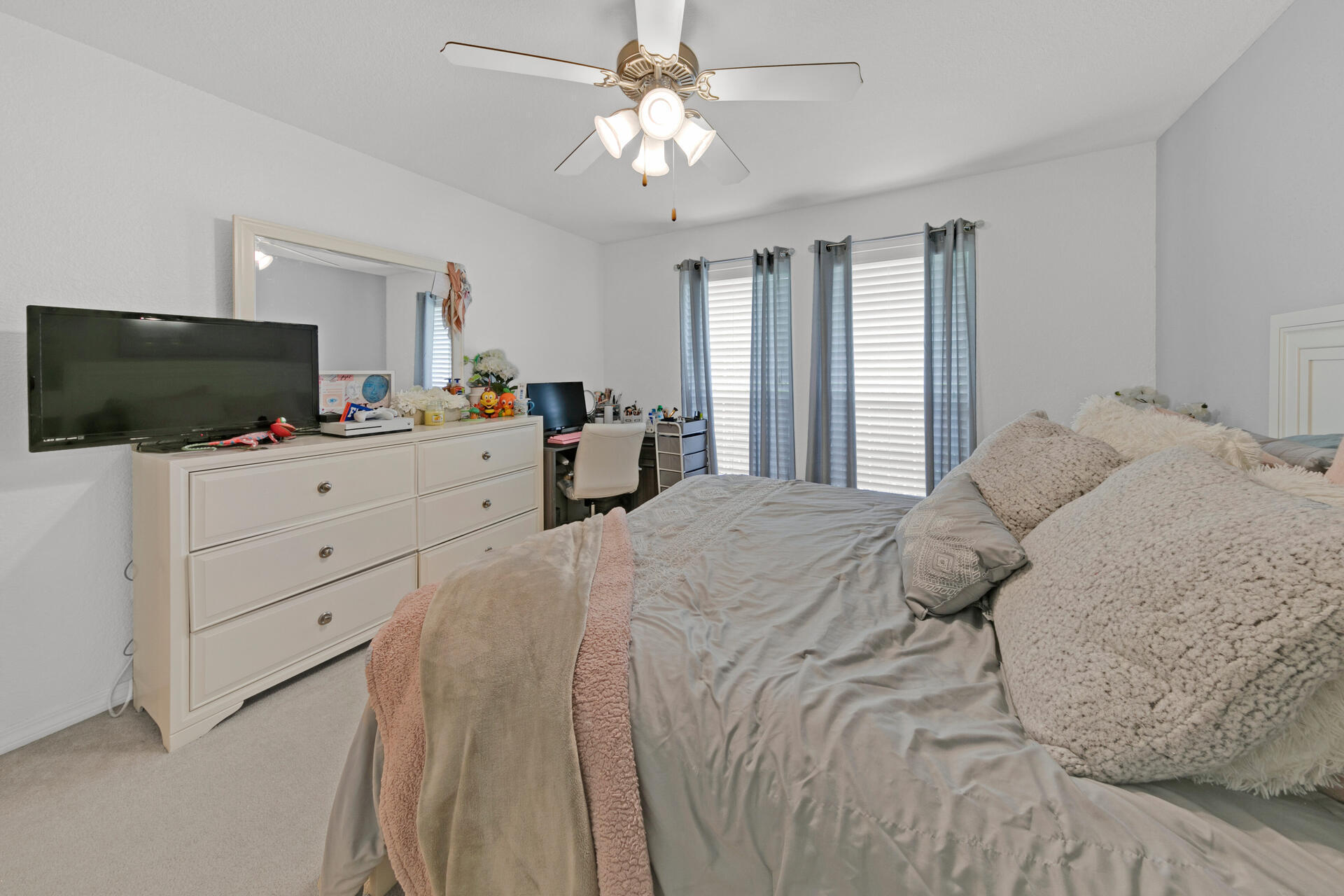 20 East Shipwreck Road Santa Rosa Beach, FL 32459 - Photo 28 of 37 a bedroom with a bed television on dresser and a flat screen tv