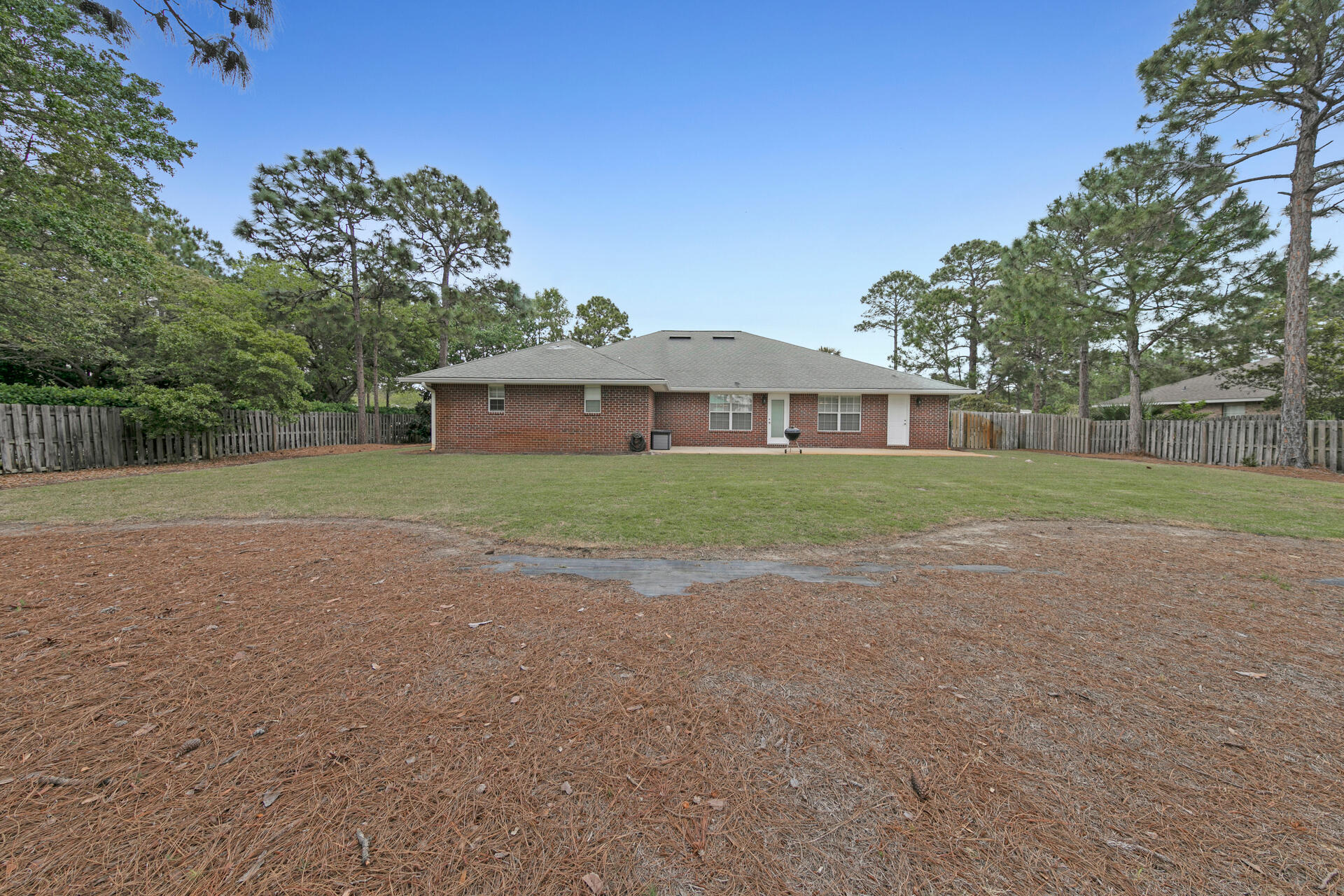 20 East Shipwreck Road Santa Rosa Beach, FL 32459 - Photo 35 of 37 a view of a house with a yard