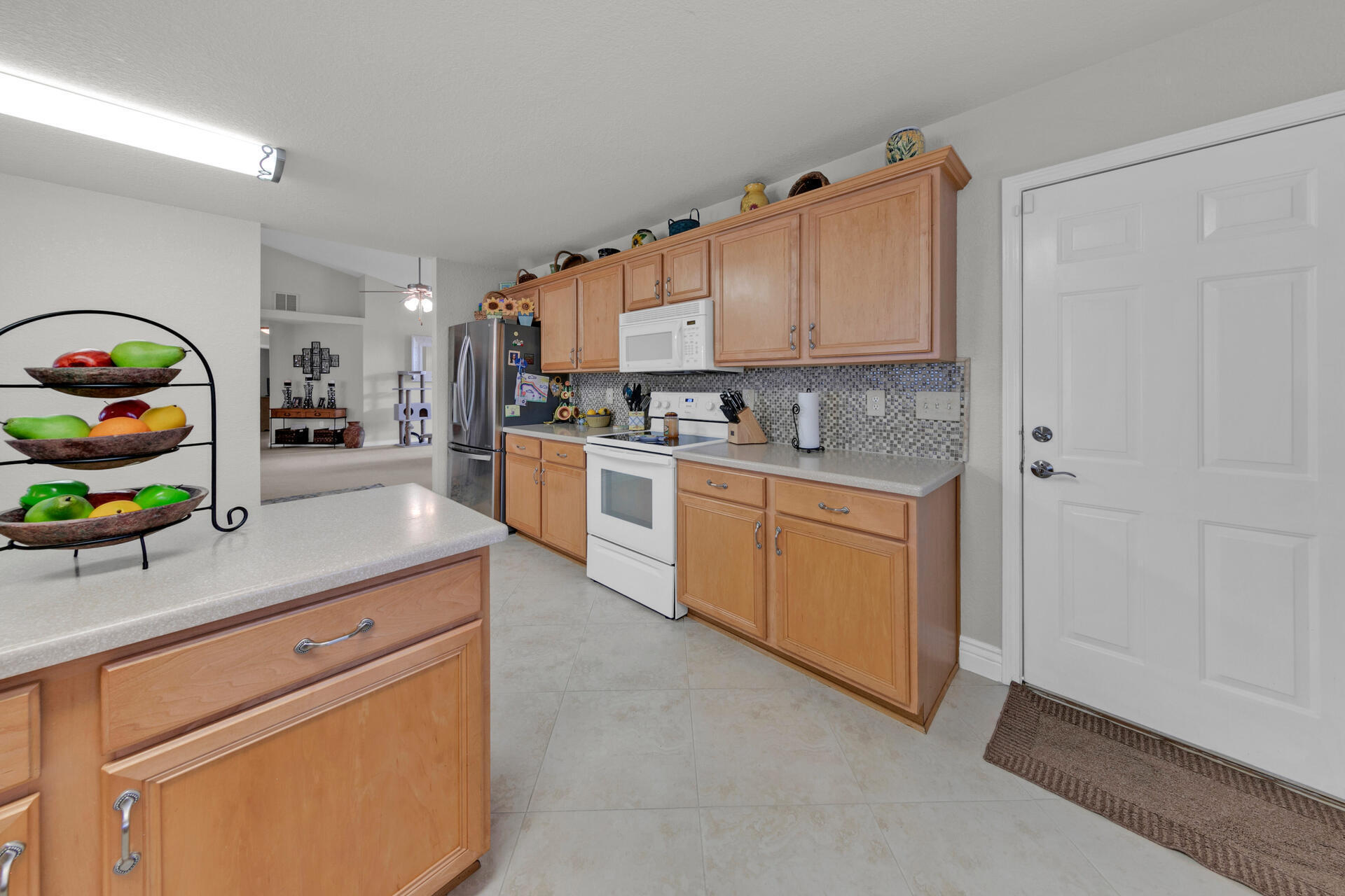 20 East Shipwreck Road Santa Rosa Beach, FL 32459 - Photo 8 of 37 a kitchen with a sink stove and cabinets