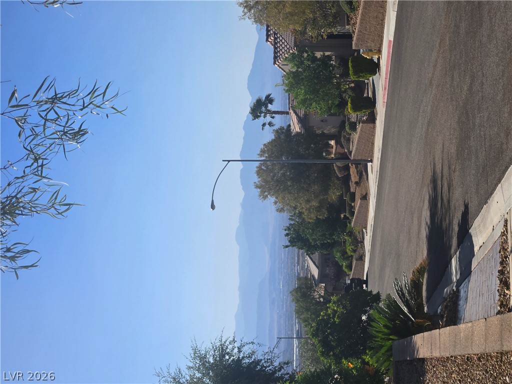 2567 Dirleton Place Henderson, NV 89044 - Photo 65 of 67 View from front yard. Ascend to panoramic desert and mountain views from this well-maintained residential street.