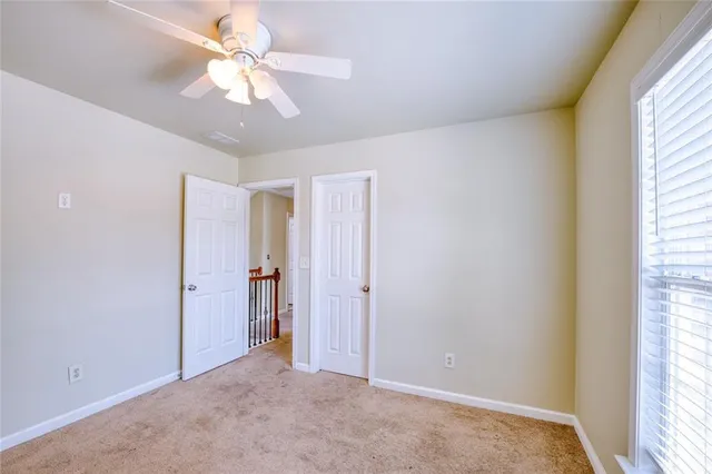 a view of yard with swimming pool and green space