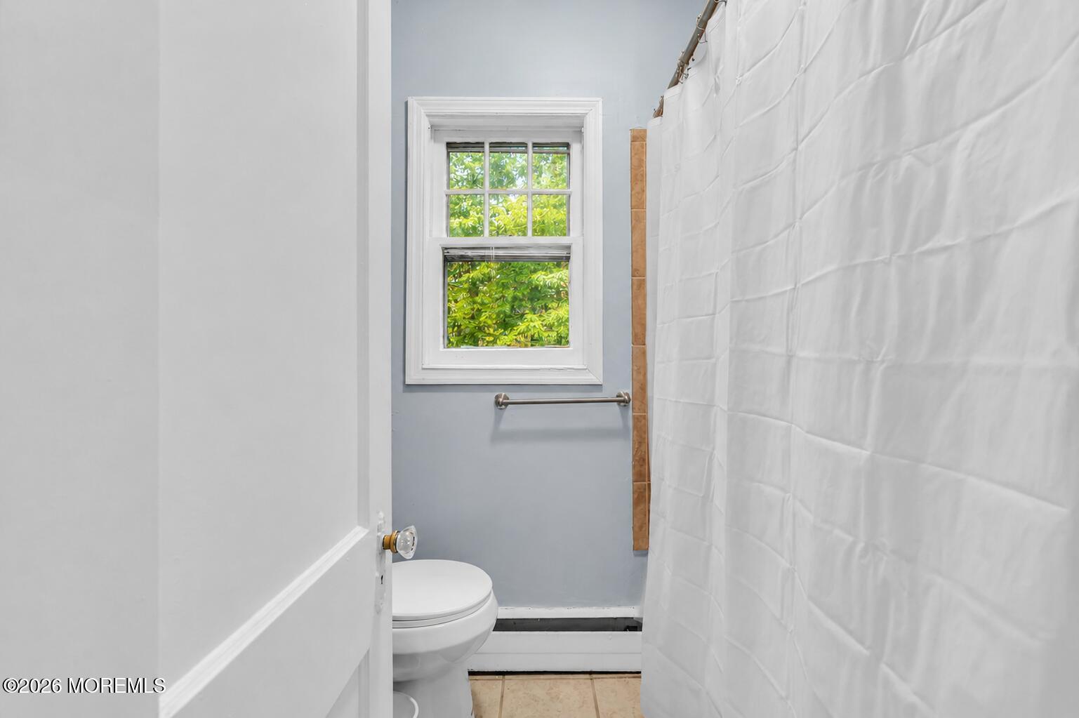 269 Alexander Avenue Howell, NJ 07731 - Photo 18 of 43 a bathroom with a sink a toilet and a window