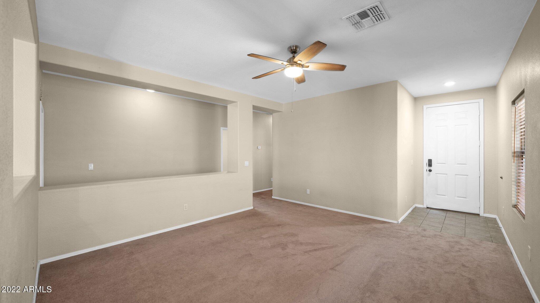 9513 West Monte Vista Road Phoenix, AZ 85037 - Photo 8 of 23 Family Room