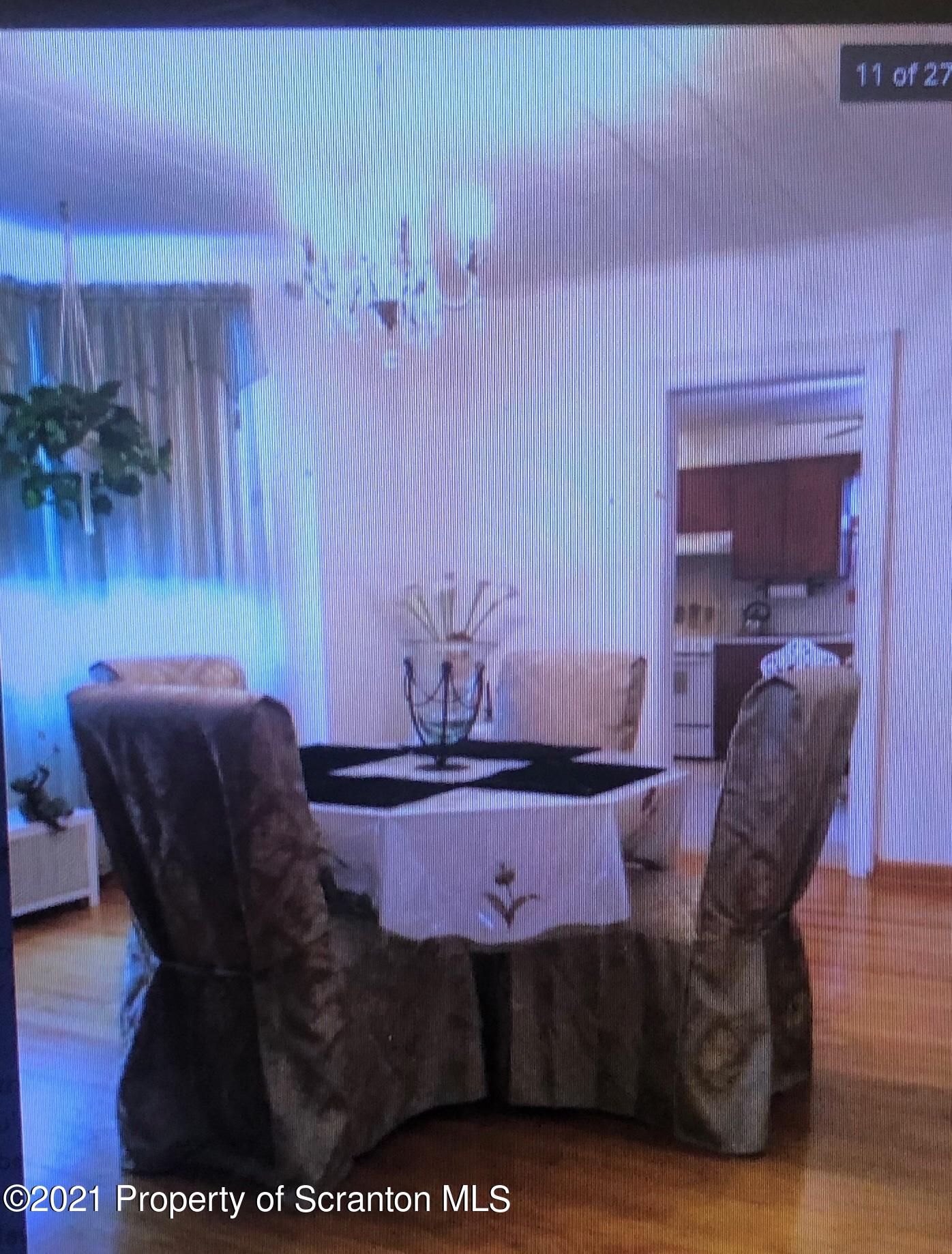 89 Belmont Street Carbondale, PA 18407 - Photo 14 of 26 a living room with furniture and wooden floor