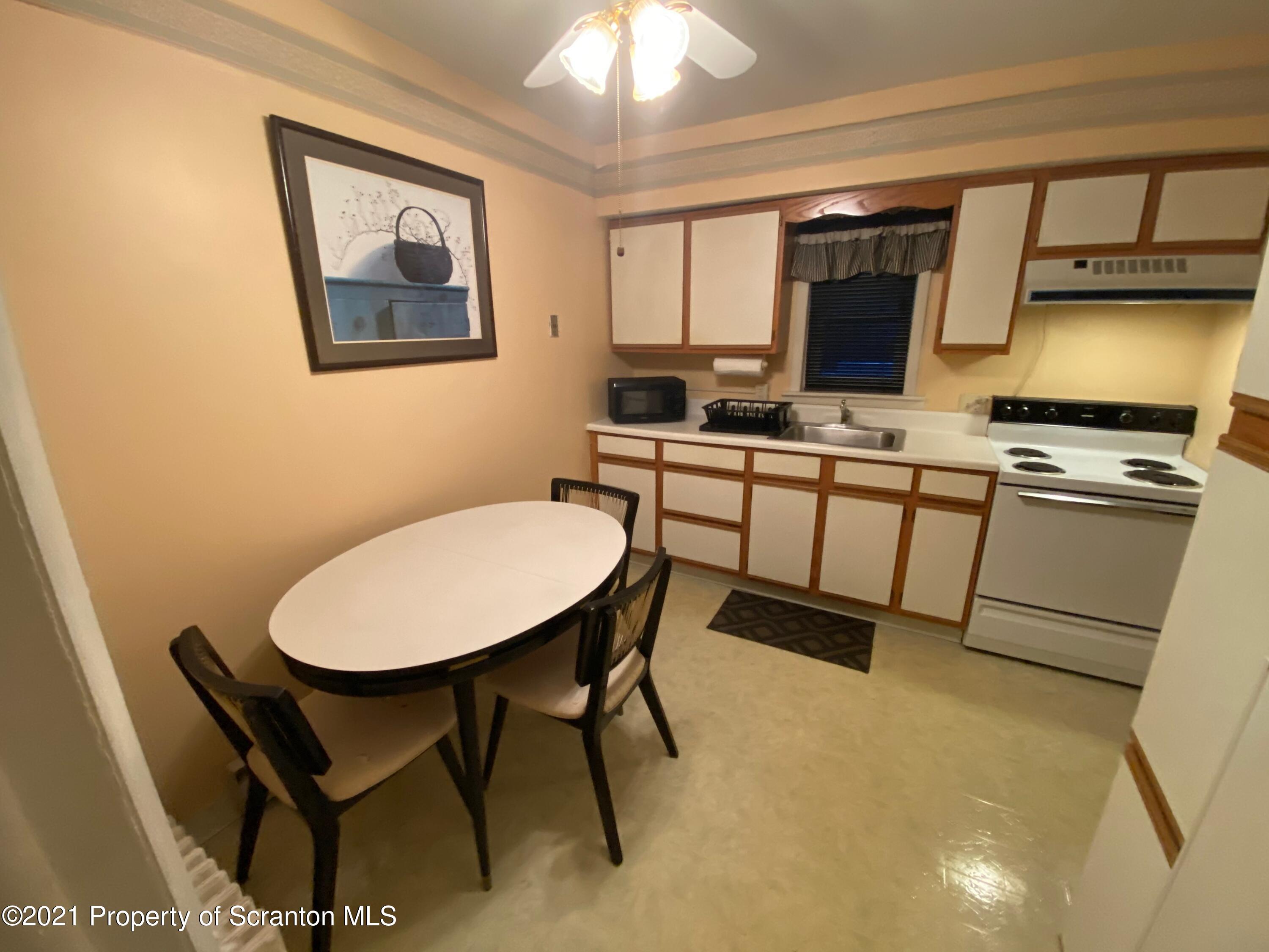 89 Belmont Street Carbondale, PA 18407 - Photo 20 of 26 a view of a dining room with furniture