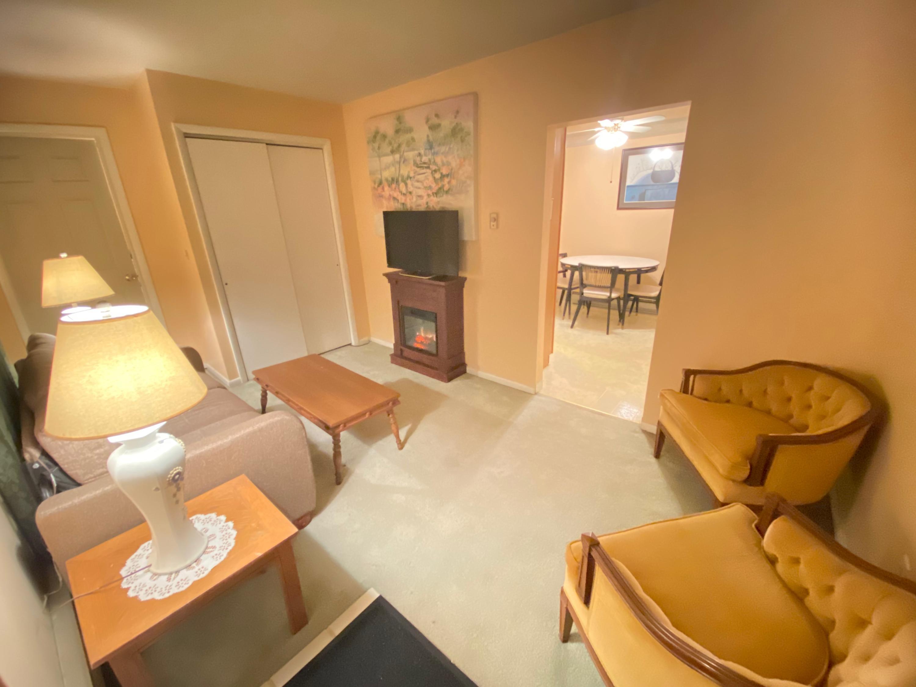 89 Belmont Street Carbondale, PA 18407 - Photo 26 of 26 a bathroom with a toilet mirror and a sink