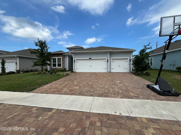 a view of a house with a garage