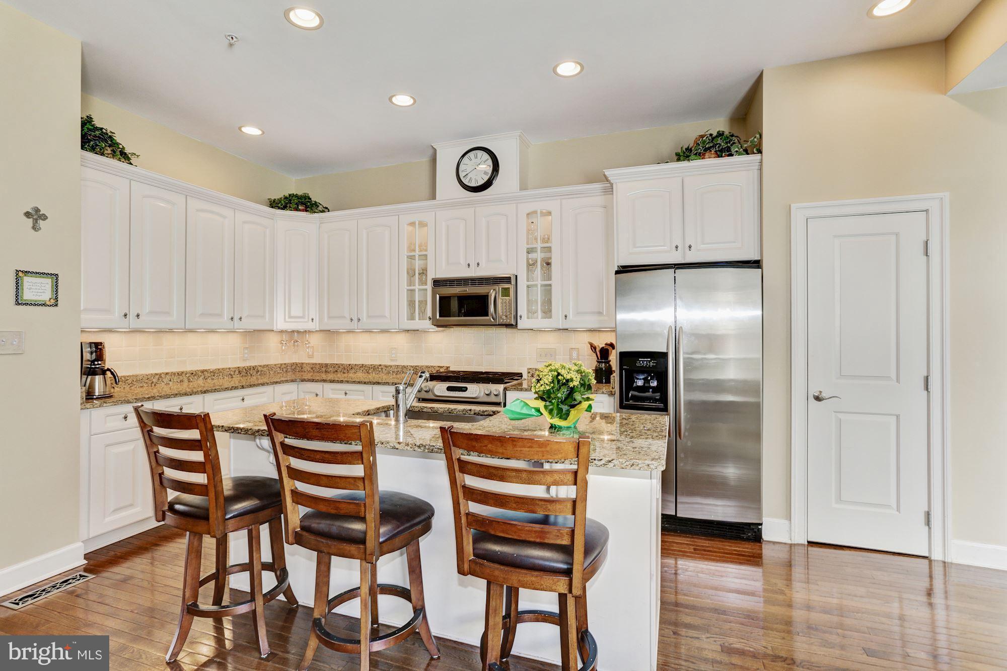 7664 Midtown Road Fulton, MD 20759 - Photo 12 of 44 Kitchen island with breakfast bar.