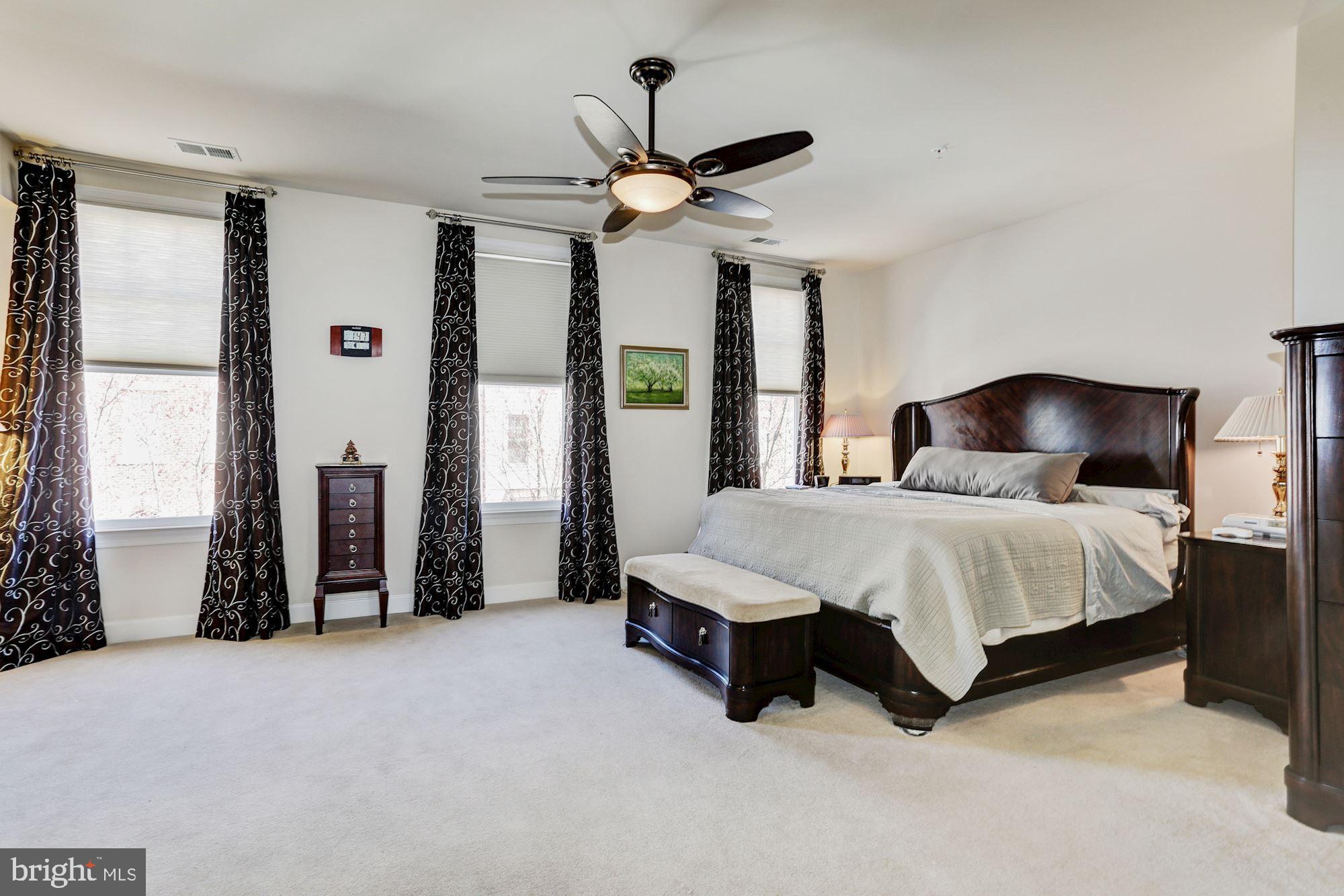 7664 Midtown Road Fulton, MD 20759 - Photo 19 of 44 Huge master bedroom with ceiling fan.