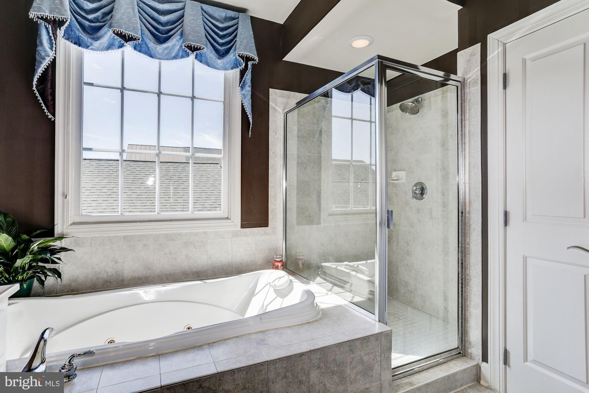 7664 Midtown Road Fulton, MD 20759 - Photo 23 of 44 Master bathroom with a separate shower stall.
