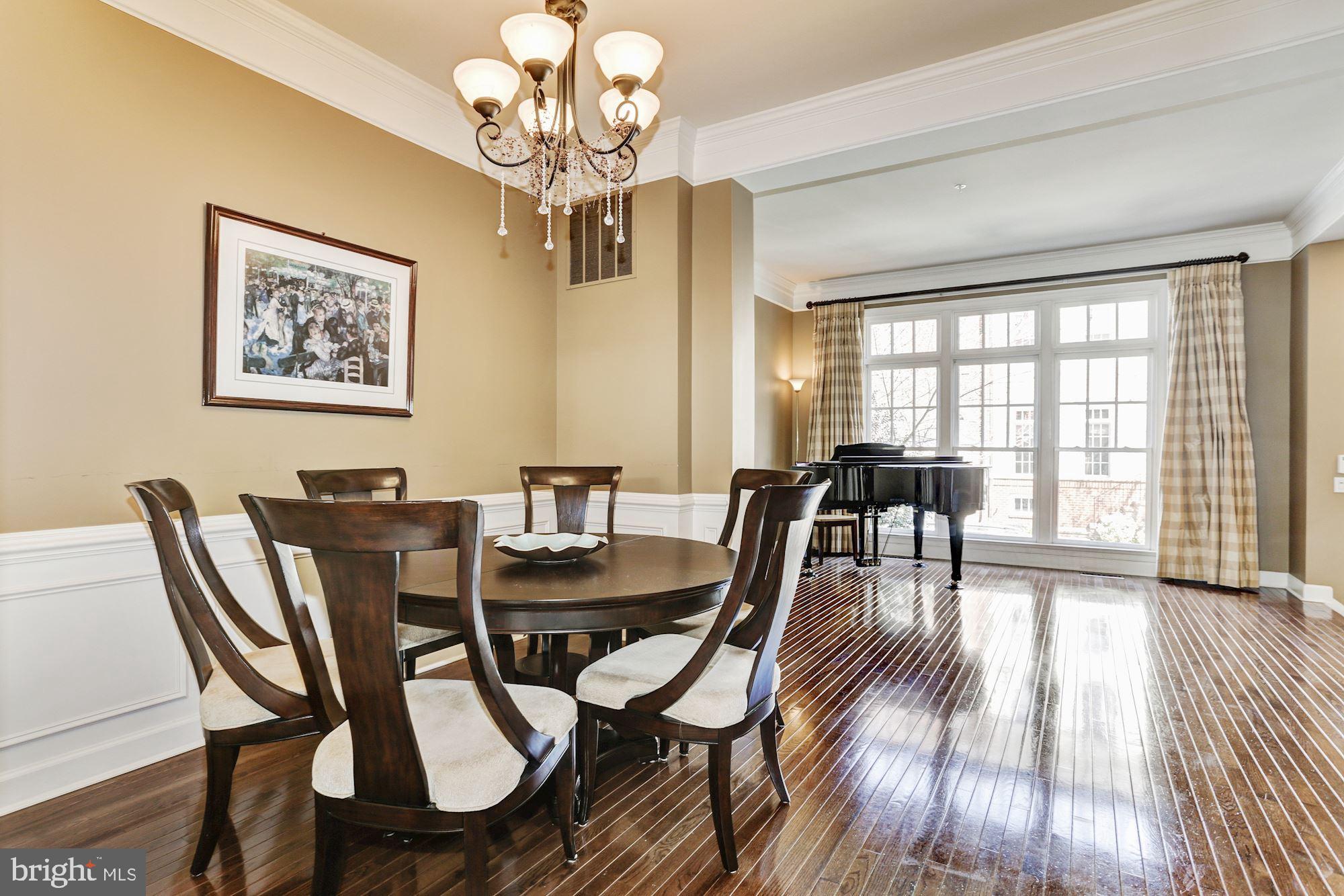 7664 Midtown Road Fulton, MD 20759 - Photo 8 of 44 Dining room with chair rails and crown molding.