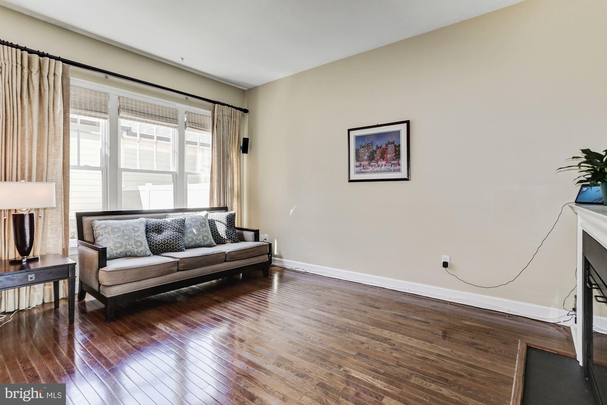 7664 Midtown Road Fulton, MD 20759 - Photo 10 of 44 Family room with floor to ceiling windows.