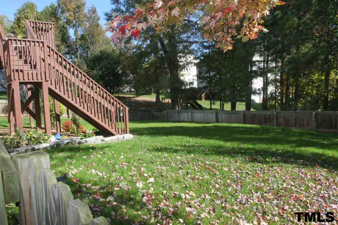 197 Mickleson Ridge Drive Raleigh, NC 27603 - Photo 2 of 25 a view of a garden with a small yard