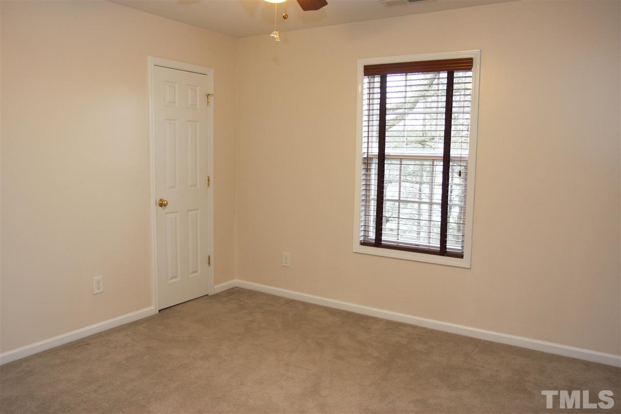 197 Mickleson Ridge Drive Raleigh, NC 27603 - Photo 21 of 25 an empty room with windows