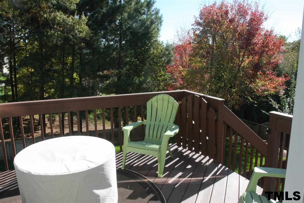 197 Mickleson Ridge Drive Raleigh, NC 27603 - Photo 24 of 25 a view of balcony with wooden floor and outdoor seating