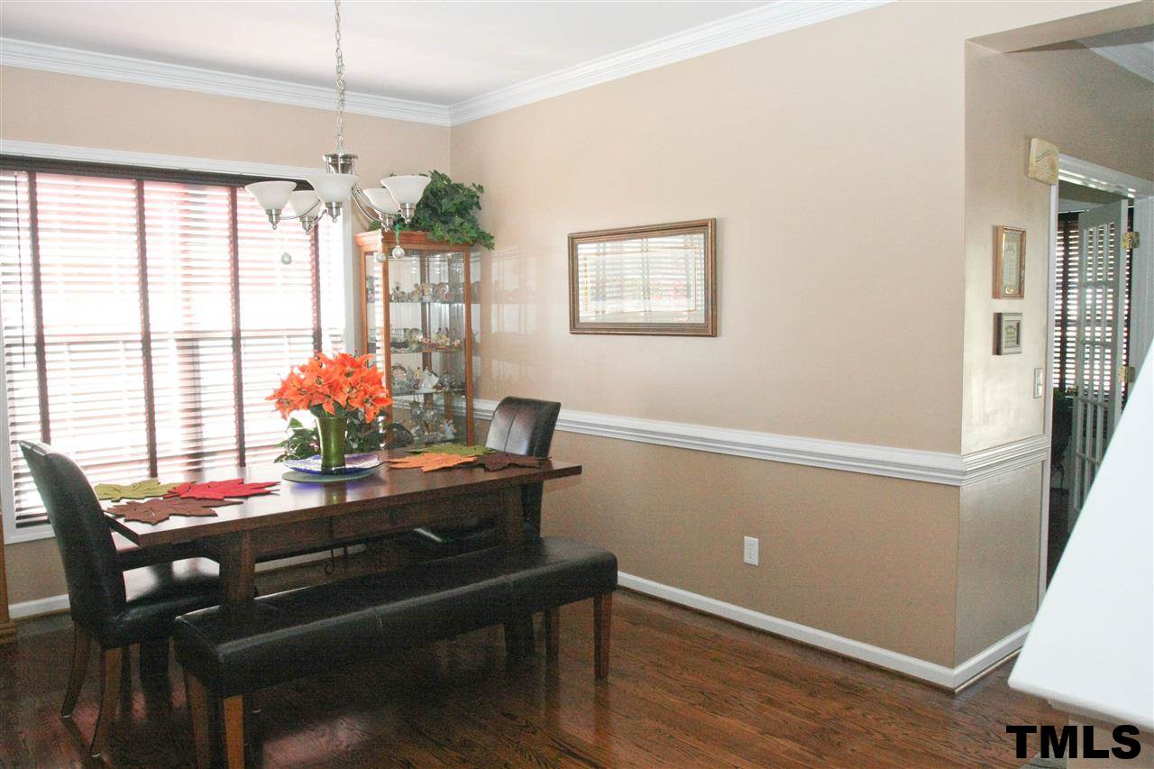 197 Mickleson Ridge Drive Raleigh, NC 27603 - Photo 10 of 25 a view of a workspace with furniture and a window
