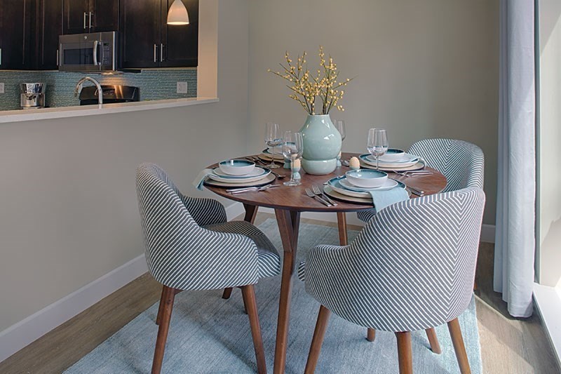 33 Rogers Street, Unit 201 Cambridge, MA 02142 - Photo 1 of 11 a view of a dining room with furniture