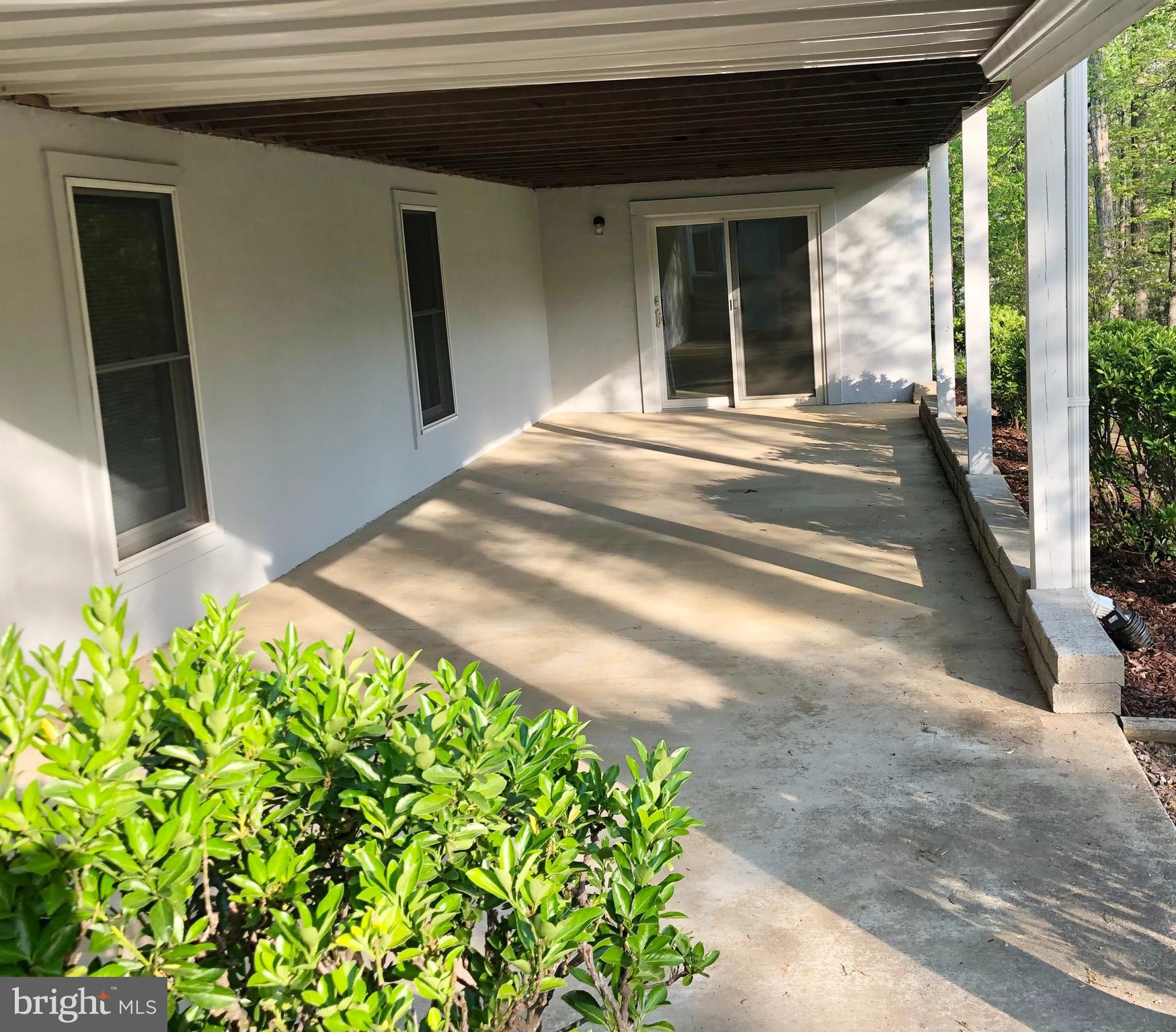 222 Birdie Road Locust Grove, VA 22508 - Photo 58 of 66 Concrete Patio Under deck!