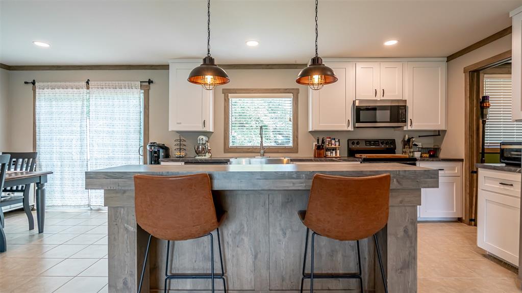 4501 Rhea Road Granbury, TX 76049 - Photo 5 of 29 Big Island with breakfast bar