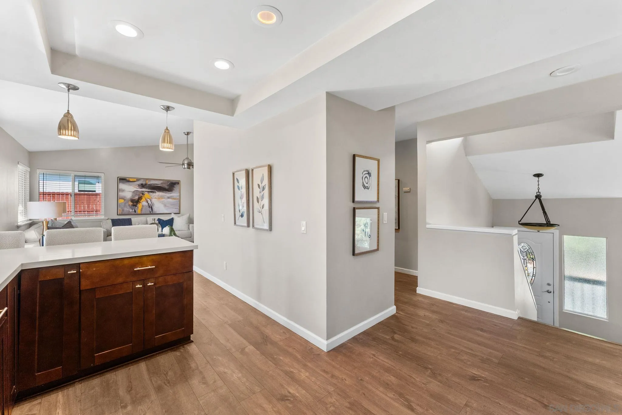 1509 Rimrock Drive Escondido, CA 92027 - Photo 12 of 48 a view of a kitchen cabinets and wooden floor