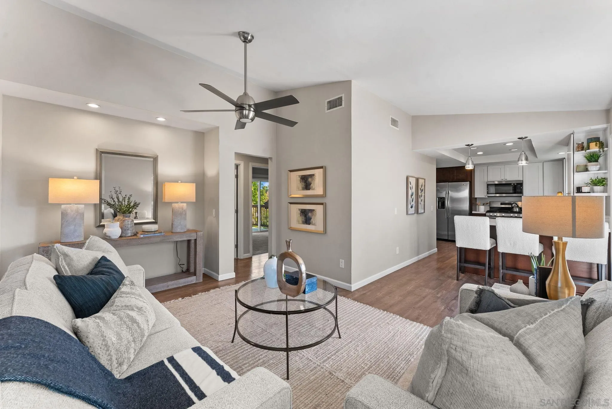 1509 Rimrock Drive Escondido, CA 92027 - Photo 16 of 48 a living room with furniture and wooden floor