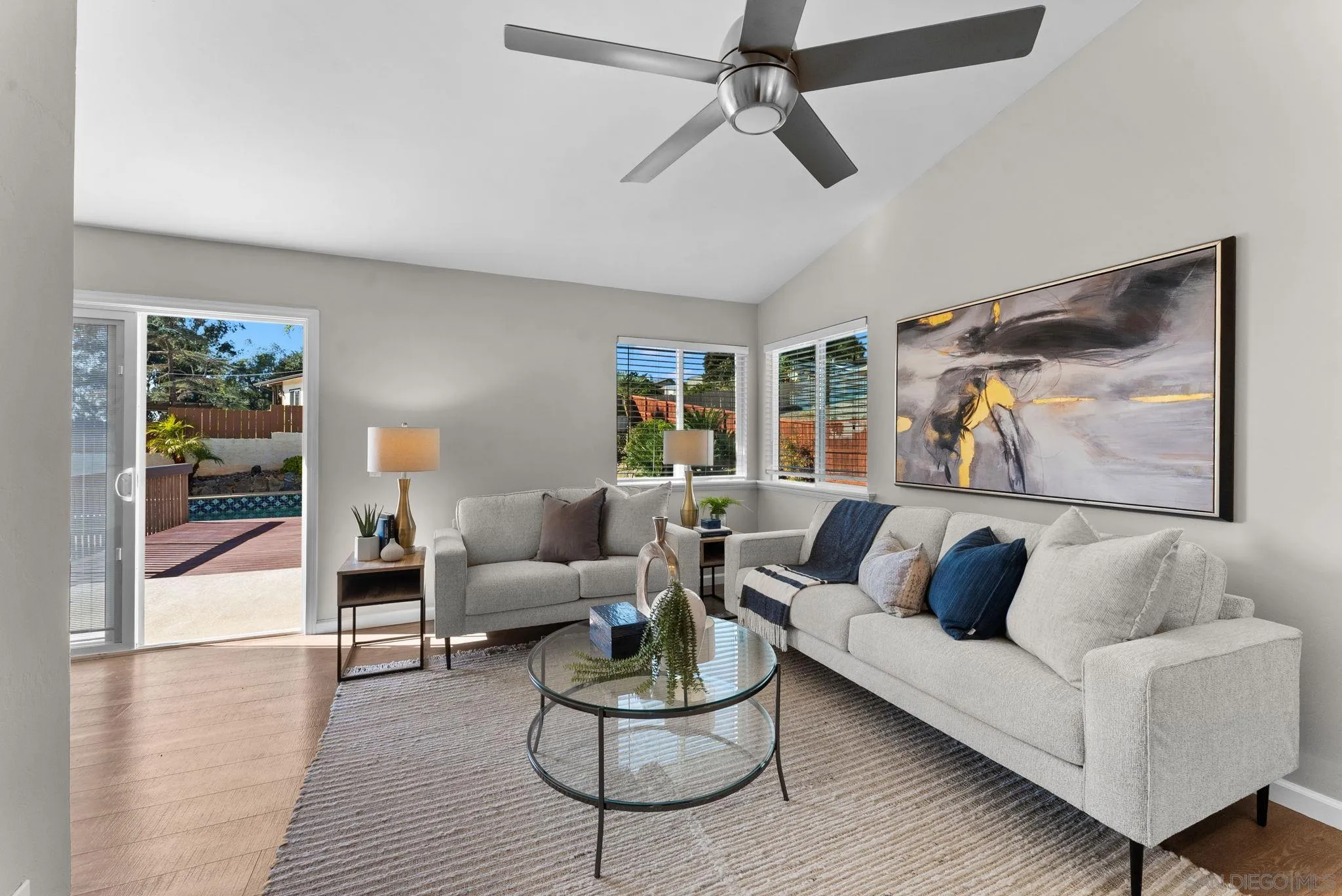 1509 Rimrock Drive Escondido, CA 92027 - Photo 17 of 48 a living room with furniture and a wooden floor