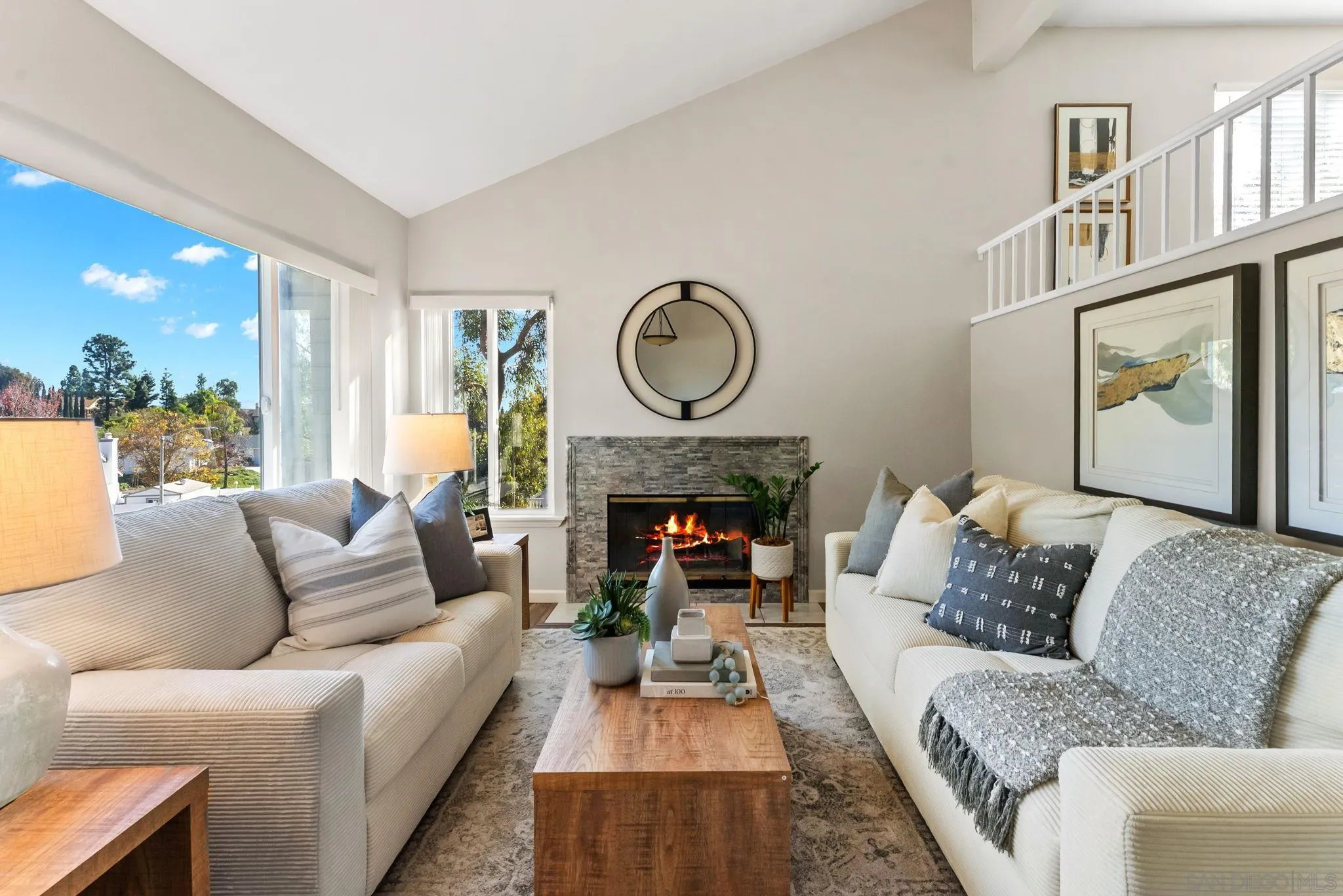 1509 Rimrock Drive Escondido, CA 92027 - Photo 2 of 48 a living room with furniture a fireplace and a large window
