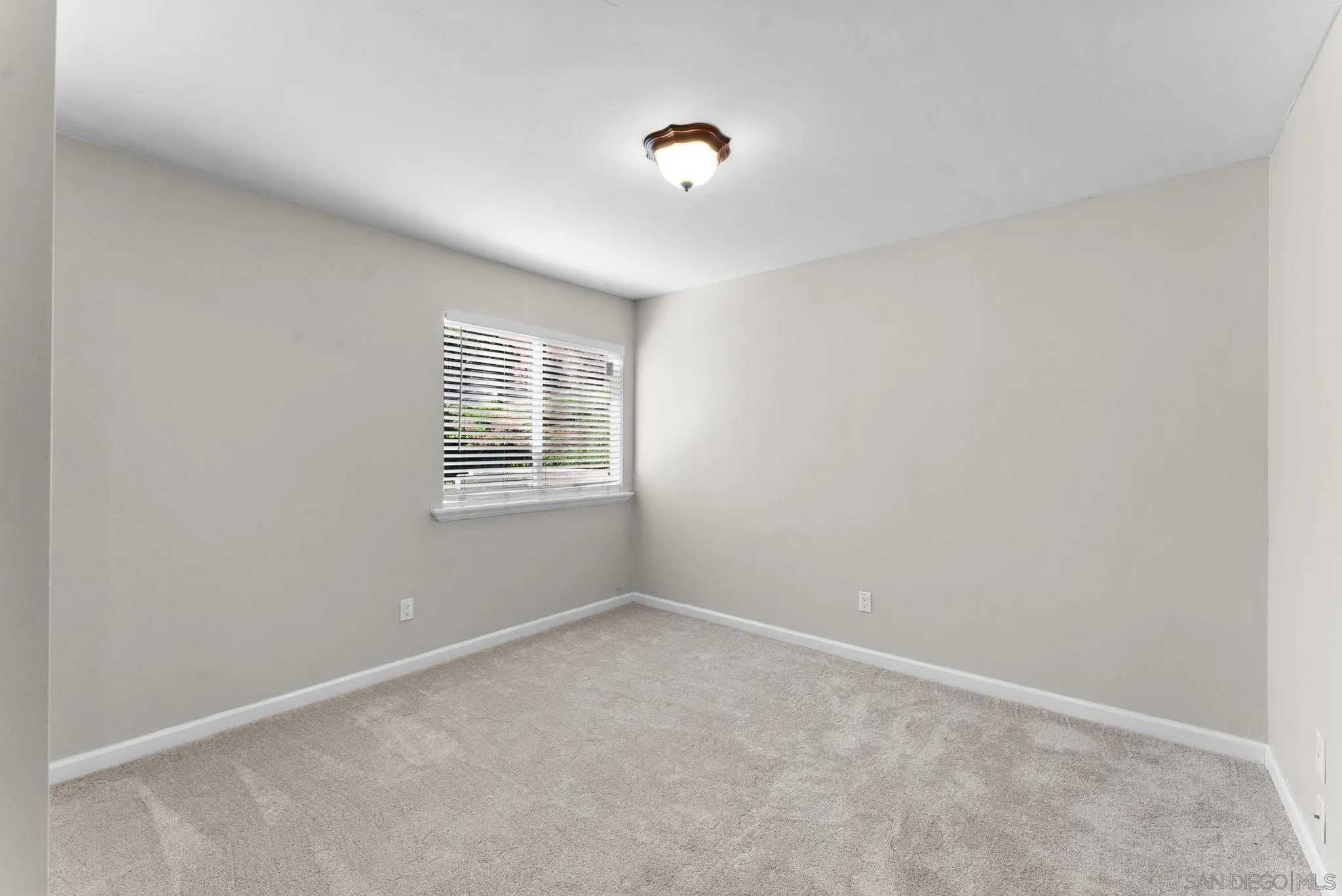 1509 Rimrock Drive Escondido, CA 92027 - Photo 27 of 48 a view of an empty room with a window