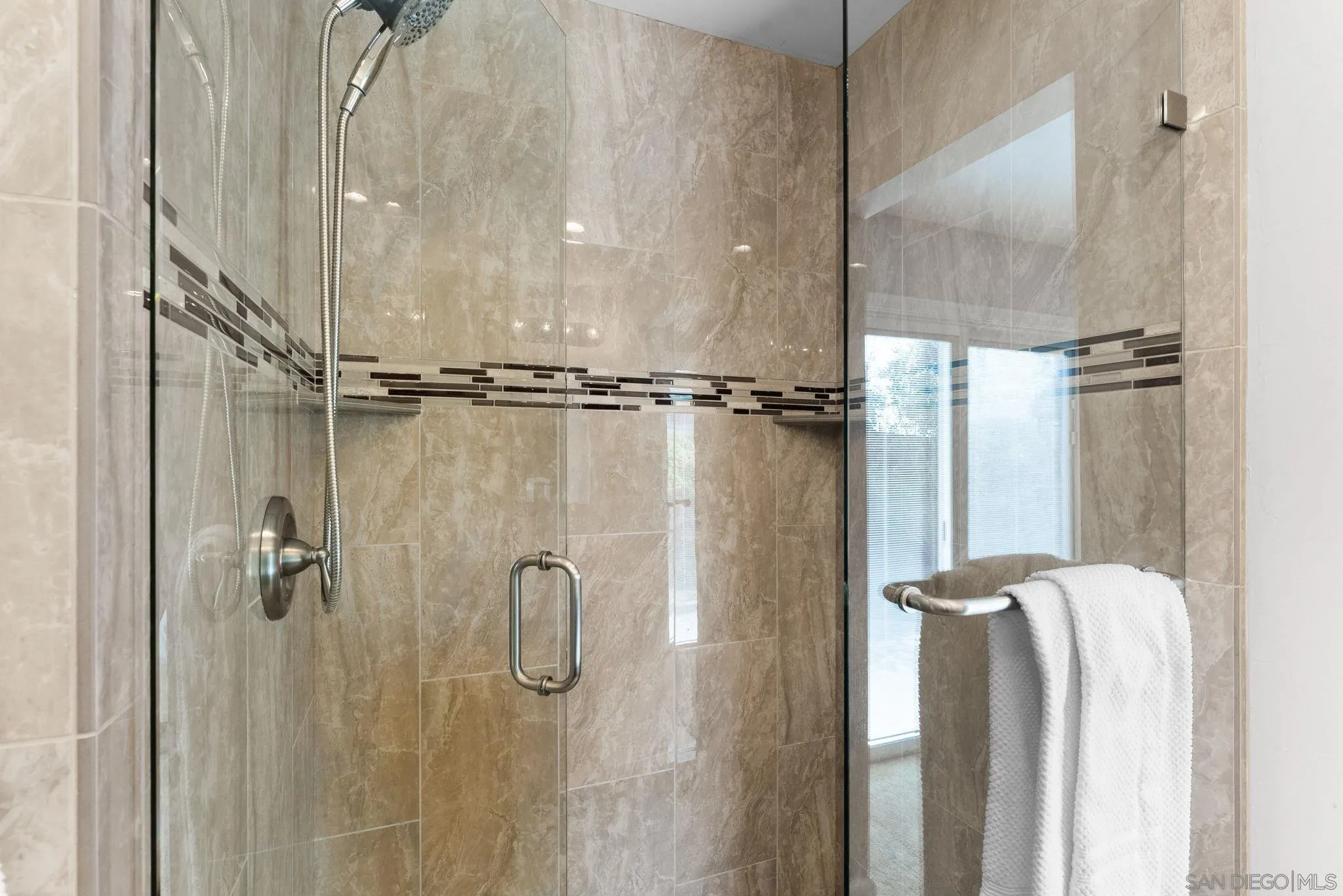 1509 Rimrock Drive Escondido, CA 92027 - Photo 33 of 48 a bathroom with a glass shower door