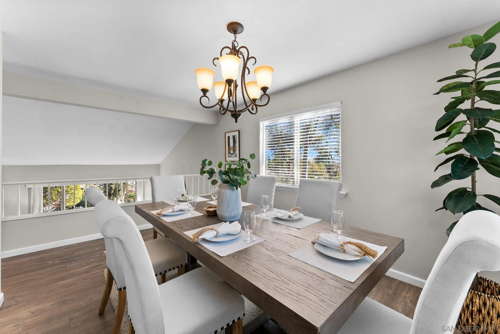 1509 Rimrock Drive Escondido, CA 92027 - Photo 7 of 48 a view of a dining room with furniture wooden floor and chandelier