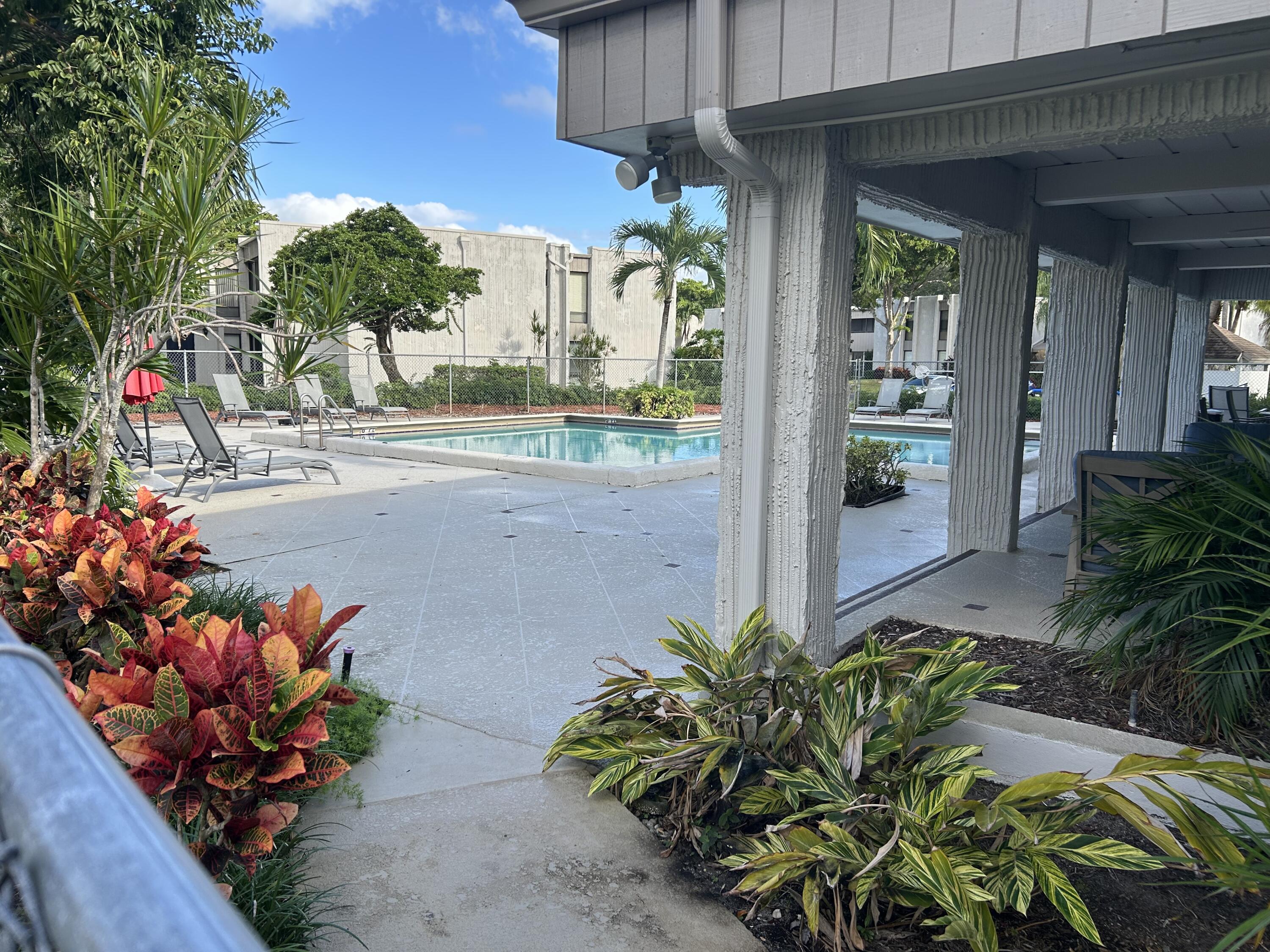 6514 Spring Bottom Way, Unit 125 Boca Raton, FL 33433 - Photo 24 of 27 Pool & Covered Deck
