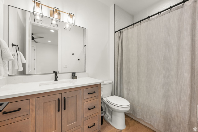 5354 Cyan Lane St. George, UT 84790 - Photo 20 of 45 Bathroom featuring vanity, a shower with curtain, light wood-type flooring, a ceiling fan, and recessed lighting