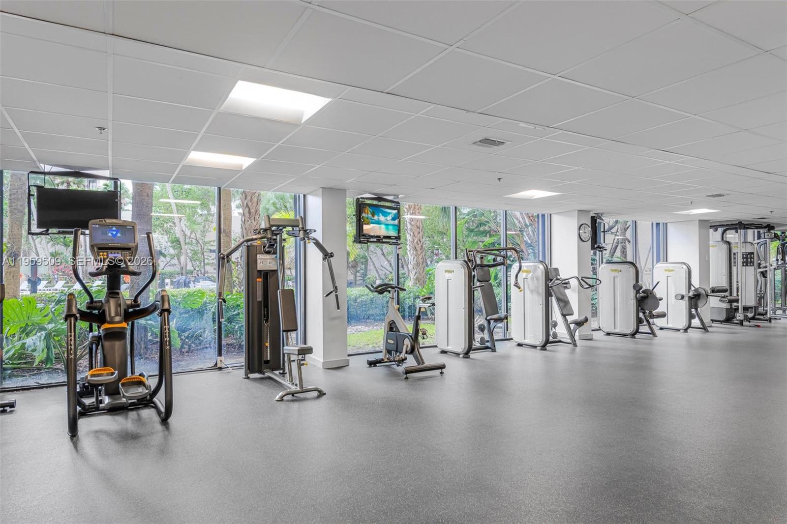 540 Brickell Key Drive, Unit 500 Miami, FL 33131 - Photo 23 of 26 a view of a room with gym equipment