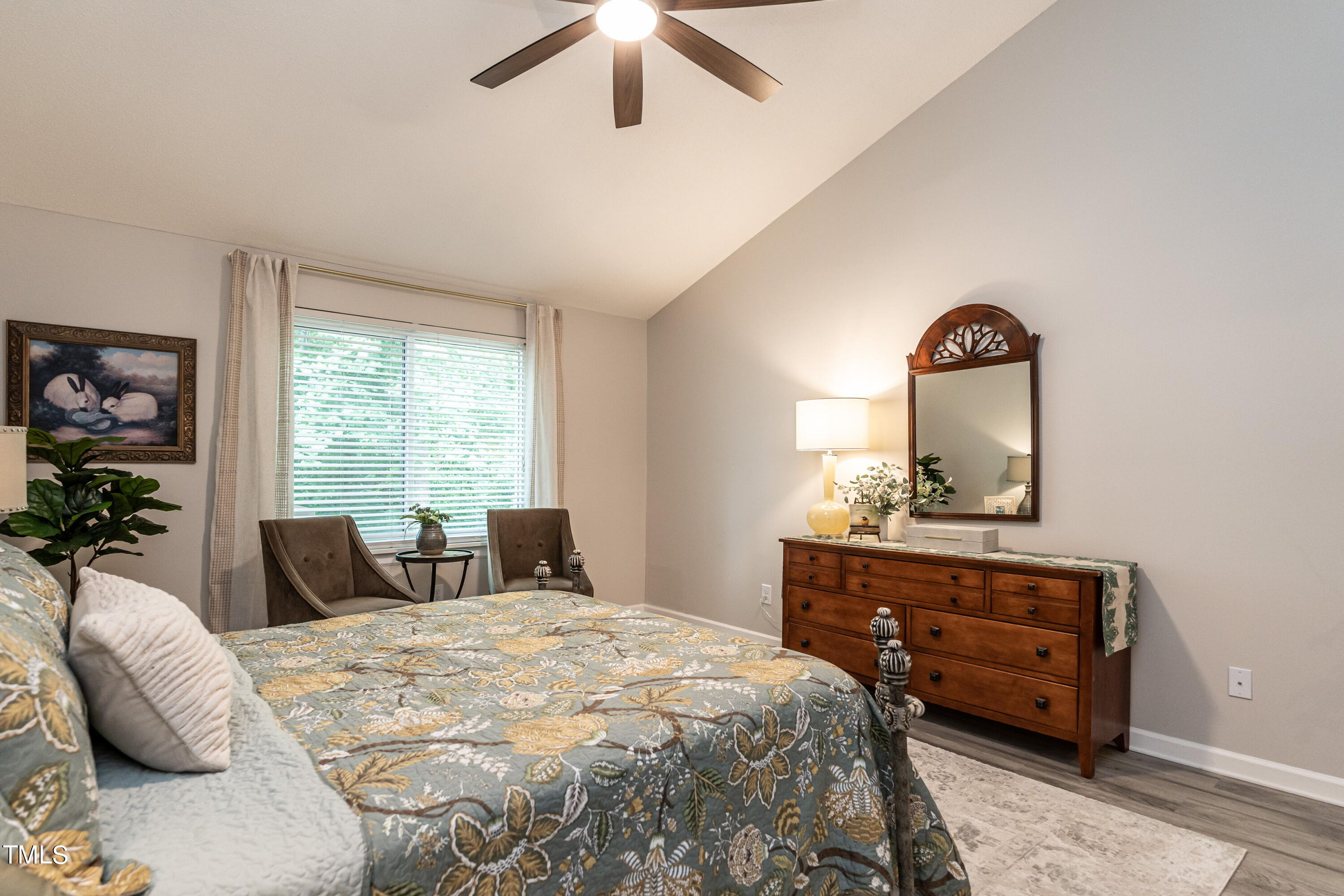 5819 Branchwood Road Raleigh, NC 27609 - Photo 27 of 40 a bedroom with a bed and a dresser