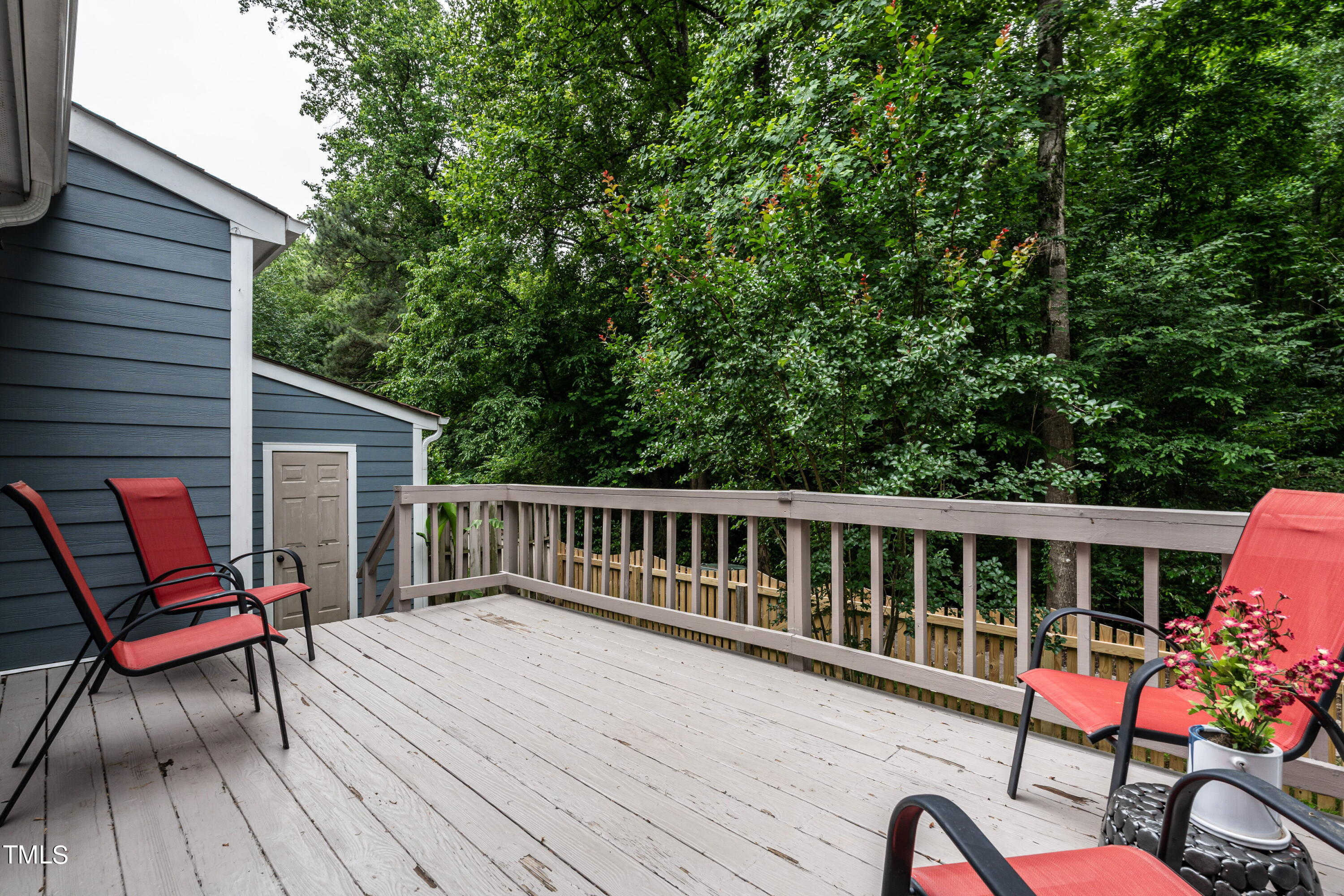 5819 Branchwood Road Raleigh, NC 27609 - Photo 35 of 40 a view of a two chairs in the roof deck