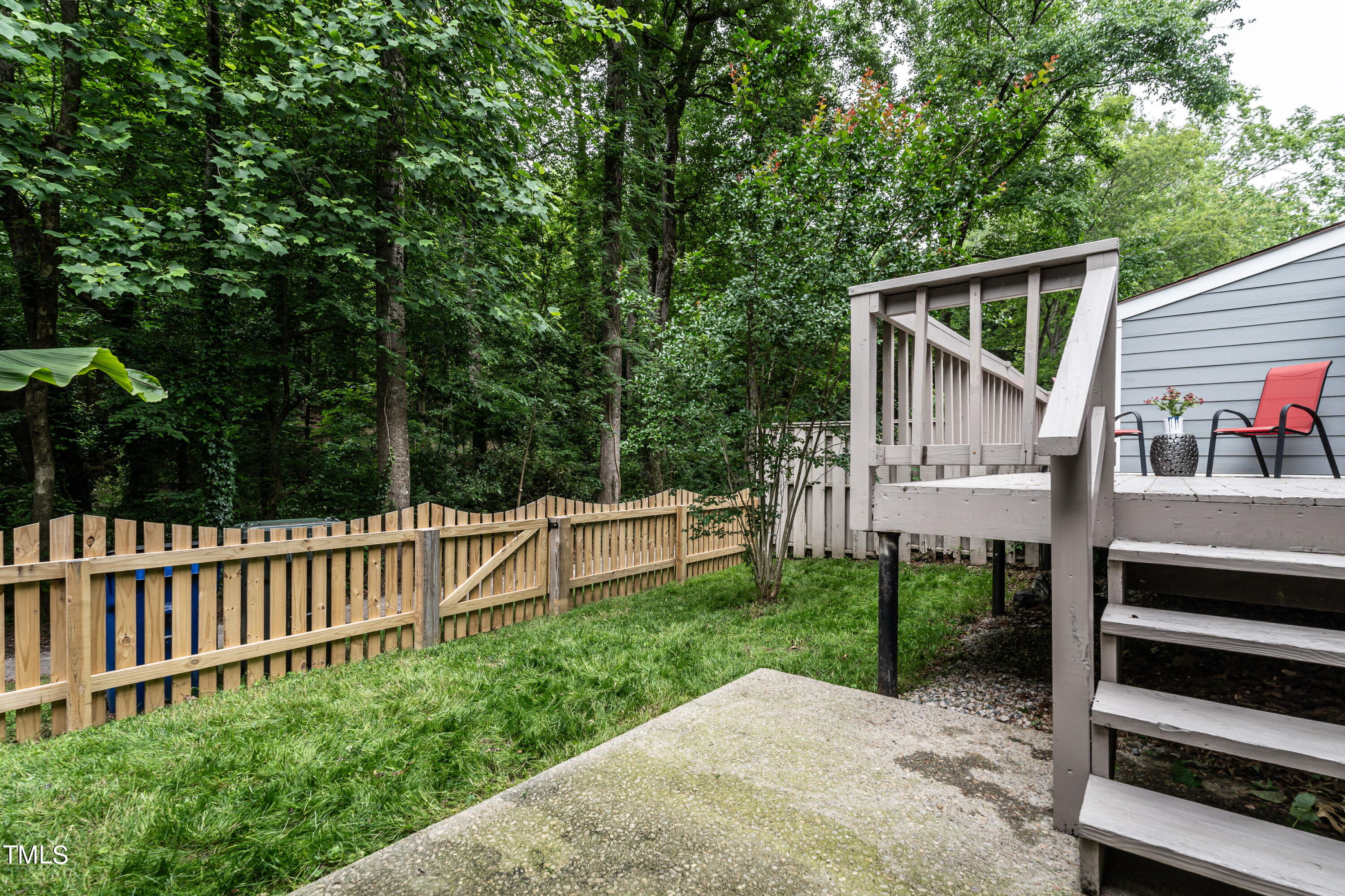 5819 Branchwood Road Raleigh, NC 27609 - Photo 37 of 40 a view of house with backyard and furniture