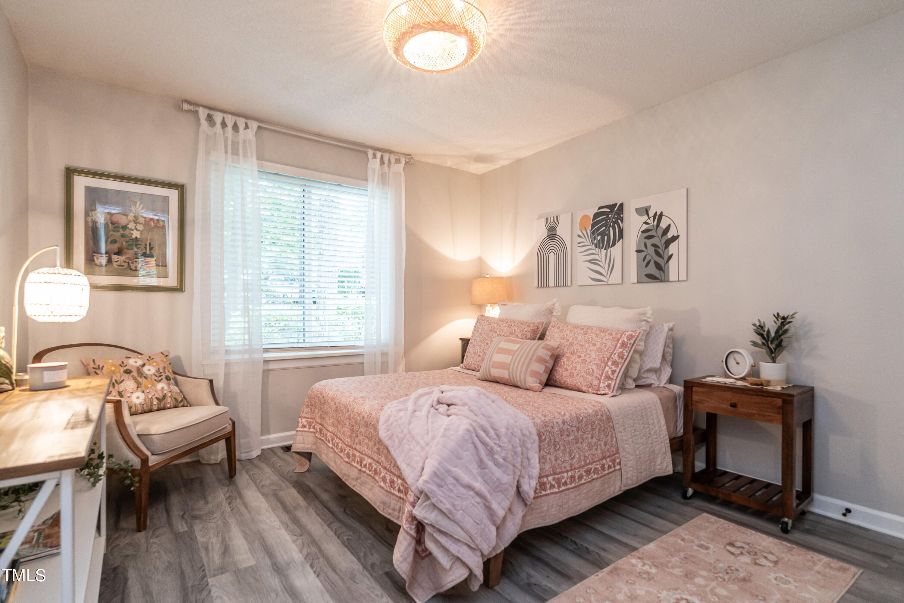 5819 Branchwood Road Raleigh, NC 27609 - Photo 5 of 40 a bedroom with a bed and a window