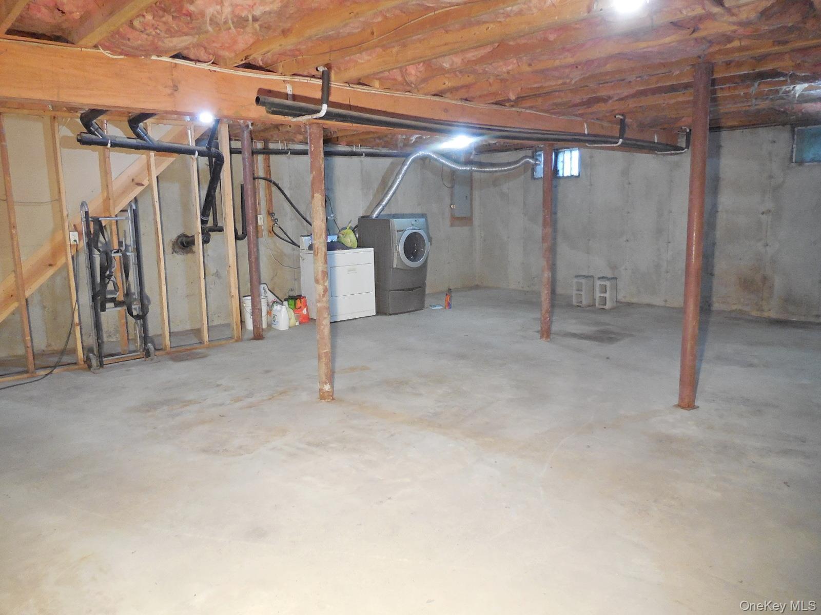 617 Burlingham Road Bloomingburg, NY 12721 - Photo 18 of 39 Laundry hook up and stairs leading to first floor.