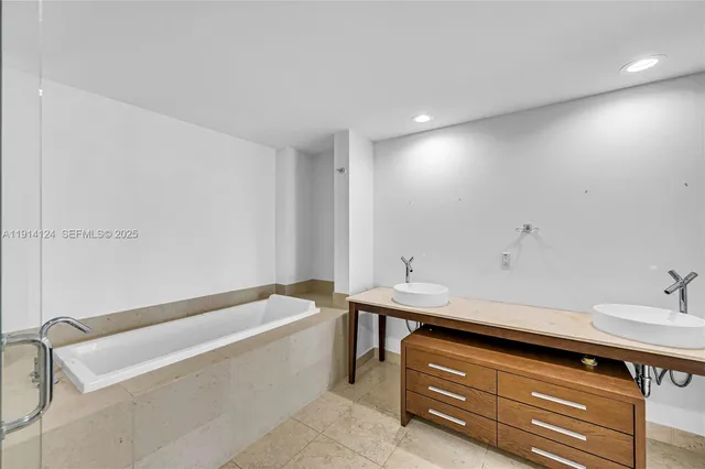 a bathroom with a sink and a bathtub