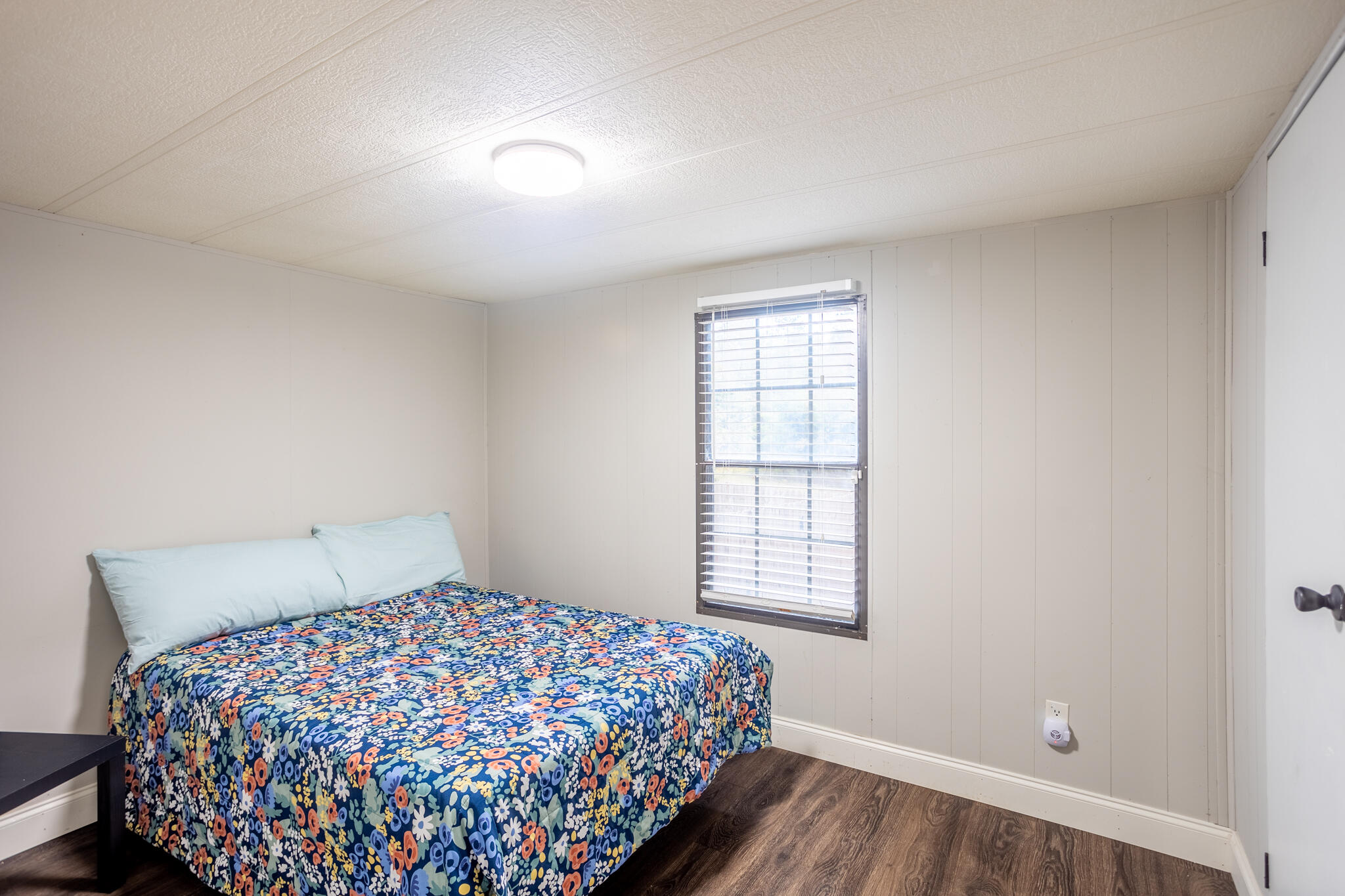 6173 Adams Road Aiken, SC 29803 - Photo 14 of 21 a bedroom with a bed and a window